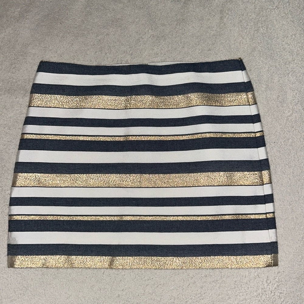So cute gold, chambray, and white striped skirt. NWOT. Size 4 gold is metallic
